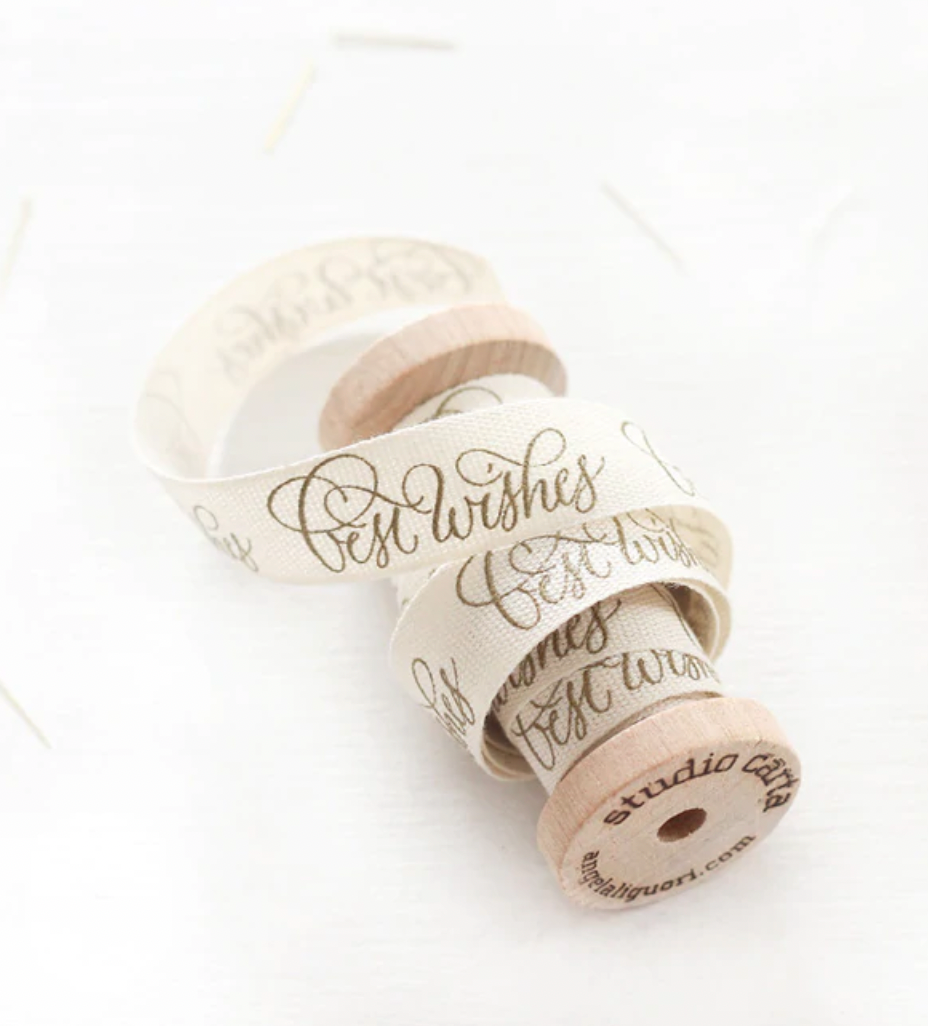 Calligraphy Ribbon on Wooden Spool