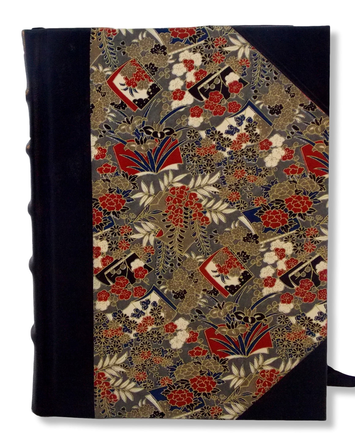 Black leather half journal featuring Japanese washi printed sides