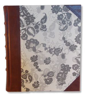 Portrait album with brown leather spine and Italian paper sides