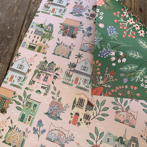 Christmas houses and green floral wrap