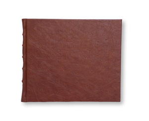 Large Chestnut Brown Leather Guest Book with Printed Pages on a white background
