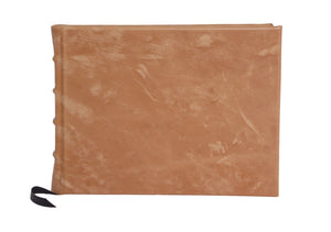 Full leather guest book in light brown with printed end papers